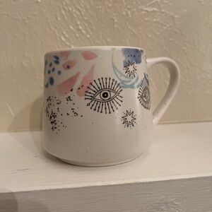 Artistic White Mug with Eye Design